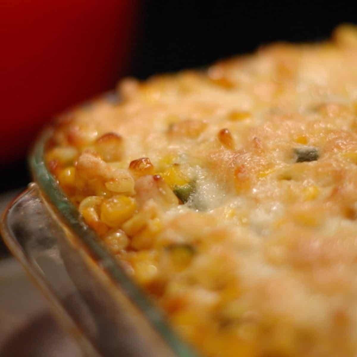 Chili-corn casserole with polenta in a glass baking dish.