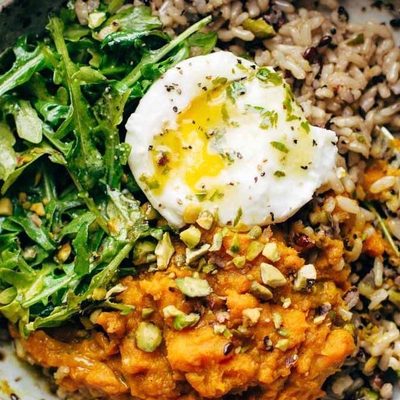Healing Bowl with sweet potatoes, rice and arugula.