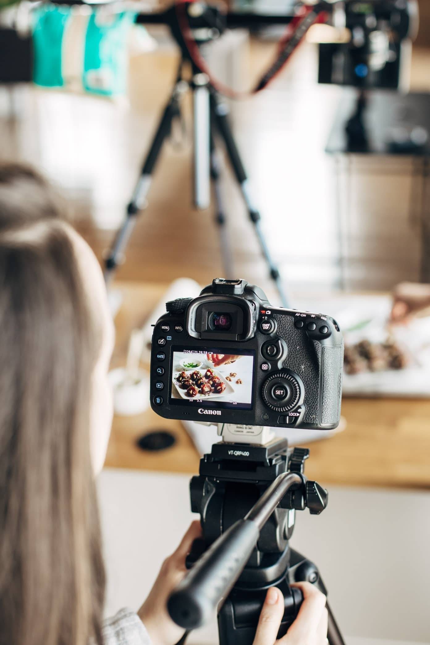 Camera taking a video of food.