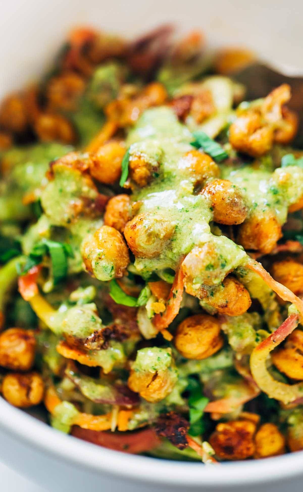 Rainbow Power Salad with Roasted Chickpeas in a white bowl.